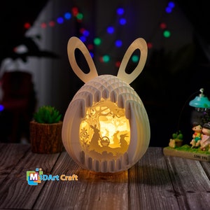 PDF, SVG, modèle de studio créant des oeufs de lapin de Pâques pop-up, famille de lapins d'oeufs de Pâques, caisson lumineux 3D, sphère de papier en tranches