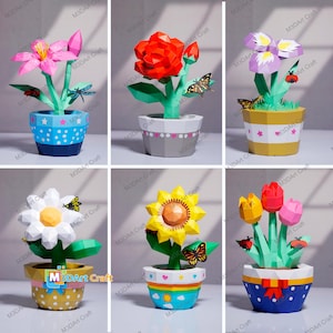 May include: A set of three ceramic mugs with a speckled, matte finish. The mugs are in shades of cream, light gray, and dark gray. Each mug has a simple, minimalist design, perfect for coffee or tea.