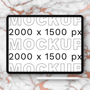 May include: A white tablet computer with a black border and a white stylus. The screen displays the text "MOCKUP 2000 x 1500 px MOCKUP 2000 x 1500 px MOCKUP" in black.