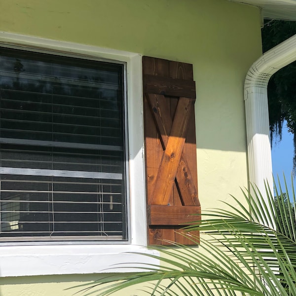Cedar Shutters finished with Cabot's Australian Oil for an exterior seal. Add an extra special touch to the exterior of your home.