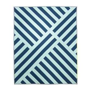 May include: A blue and light blue striped quilt with a geometric pattern. The quilt is made of cotton fabric and has a white border.