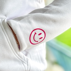 Smiley Bügelbild in pinker Flockfolie zum selbst aufbügeln auf T-Shirts, Hoodies, Taschen, Socken oder vieles mehr