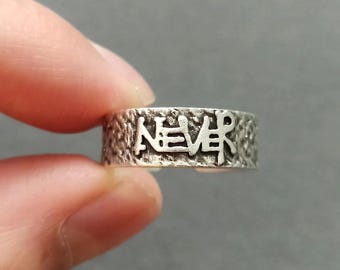 Anillo ajustable inspirador "Nunca te rindas"