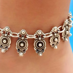 Front view of handcrafted boho anklet showing detailed design and adjustable chain.