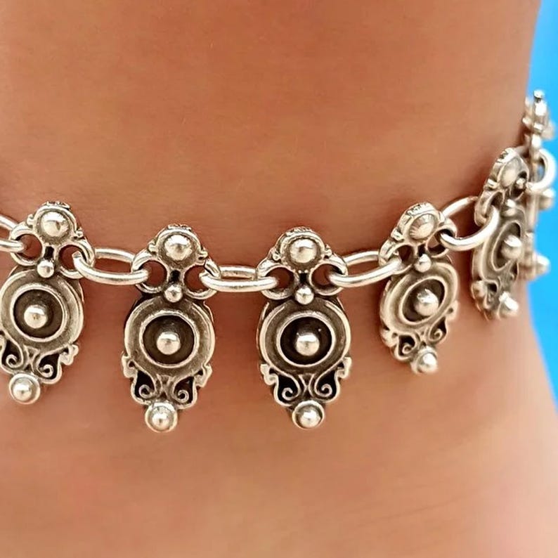 Front view of handcrafted boho anklet showing detailed design and adjustable chain.