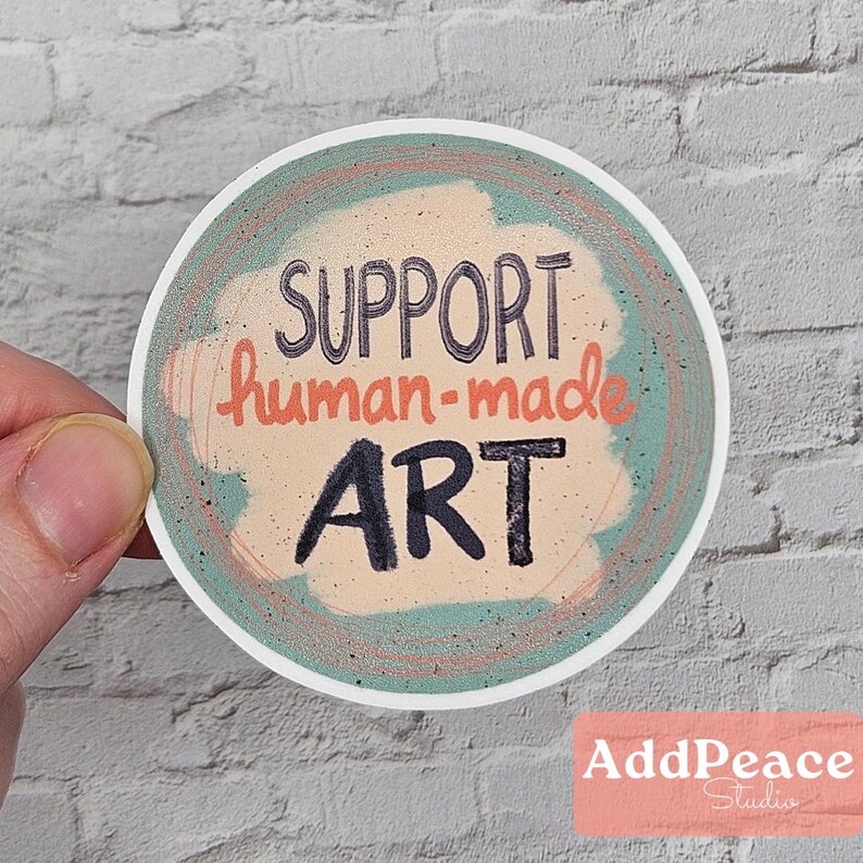 Support human-made art is hand-written over a scribbled background