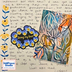 May include: A sticker featuring blue and yellow pansy flowers surrounding the text 'Doing my best' in yellow, placed next to a rectangular card with an abstract floral illustration in blue, orange, and green, all on a handwritten letter background.