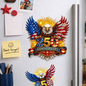May include: A fridge magnet set with a patriotic theme. The main magnet shows a bald eagle with red, white, and blue wings, commemorating the 250th anniversary of the United States. Text includes "250 Anniversary 1776-2026".