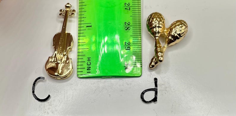 Tiny Golden Musical Instruments: Bass Guitar Violin Maracas Drums ...