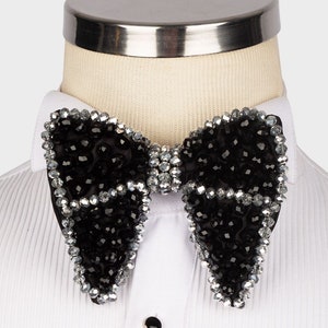 Black bow tie with black crystal and white crystal in the middle