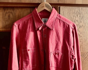 John Lofgren red work shirt