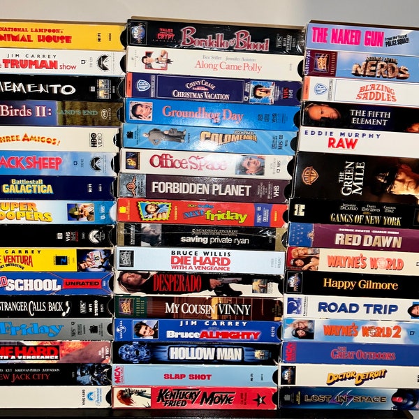 VHS movies vintage selection.  Bordello of Blood, Office Space, Groundhog Day, Three Amigos, Super Troopers, Happy Gilmore, Black Sheep