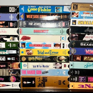 VHS movies vintage selection #2. The Mummy, Rambo III, The Godfather II, Commando, Platoon, Along Came Polly, Rudy