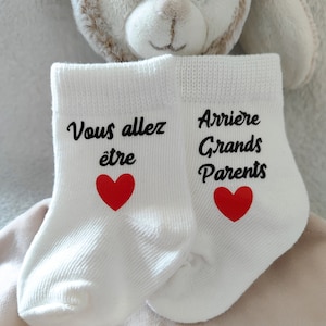 Baby socks announce pregnancy great-grandparents/future great-grandparents