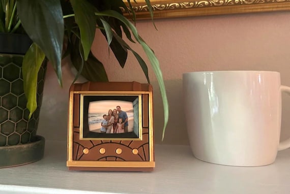 A handmade mini retro TV that's actually a live WiFi digital photo frame — no cloud, no subscription, just analog charm hiding modern smarts.