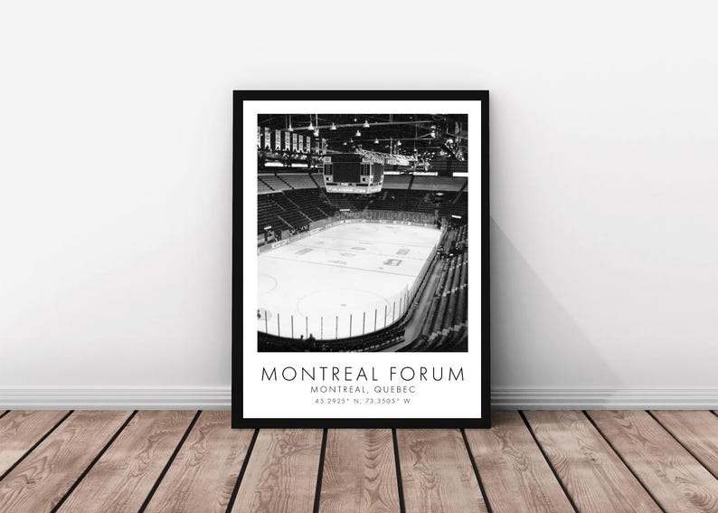 May include: Black and white framed print of the Montreal Forum ice hockey arena. The image shows the empty arena with the ice rink and seating. Text at the bottom reads "MONTREAL FORUM, MONTREAL, QUEBEC" with coordinates.