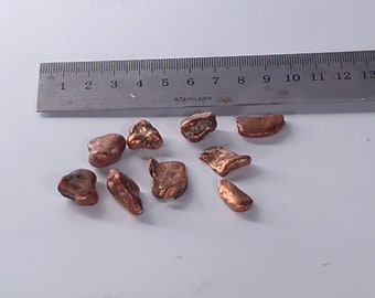 Lot of 9 nuggets of NATIVE COPPER from MICHIGAN.