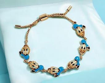 NUEVA pulsera de repetición del Pato Donald de Disney. Licencia oficial de Disney. Nueva con etiquetas.