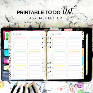 May include: A printable to-do list in A5 size, with a half-letter format. The page is divided into two columns, each with a heading "To do list". The page is decorated with colorful dots and lines.