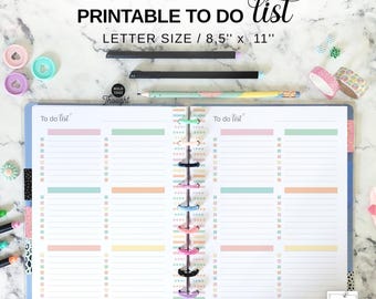 May include: A printable to-do list notebook with pastel-colored horizontal lines and the text "PRINTABLE TO DO LIST". The notebook is open, showing lined pages with a spiral binding. The size is 8.5" x 11". There are pens, washi tape, and decorative paper clips.