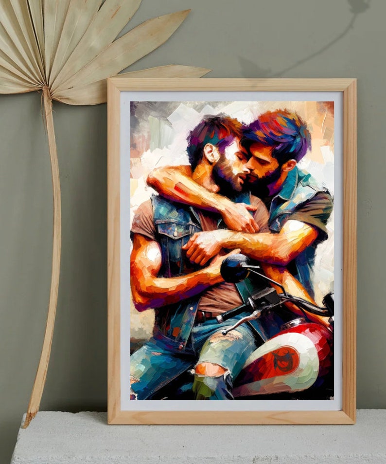 May include: A painting of two men embracing on a motorcycle. The men are wearing denim jackets and jeans. The painting is done in a colorful, impressionistic style.