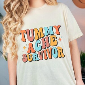 Vintage Tummy Ache Survivor Gift Shirt for Stomach Ache Survivors, Funny Tummy Hurts Shirt for Women and Men, Unisex T-Shirt