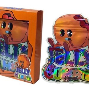 K&ouml;nnte beinhalten: Orangefarbene Schachtel und holografische T&uuml;te mit einer Cartoon-Gelee-Figur. Der Text "JELLY" und "JELLY COMBO" sind sichtbar. Die Gelee-Figur ist orange mit einem Biss und einem traurigen Gesichtsausdruck.