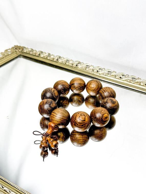 METAL BEAD BRACELET W/TASSEL CHOCOLATE BROWN METAL BEAD BRACELET W/TASSEL CHOCOLATE BROWN