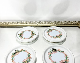 Set di quattro sottobicchieri in porcellana vintage con farfalle e fiori rosa