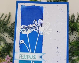 Tarjeta de felicitación con flores en tonos azules