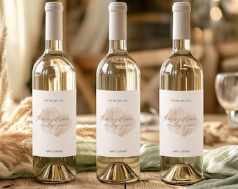 May include: Three wine bottles with white labels that read "You're not old. This is just your vintage year. Happy Birthday." The bottles have a light-colored liquid and are topped with a light-colored cap.