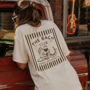 Custom Nashville Bachelorette Comfort Colors Shirts, Cowgirl Bach Merch, Personalized The Bach Club Lucky in Love Wine Girls Weekend Tees