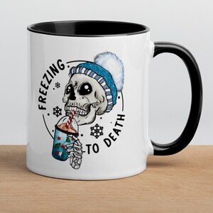 Freezing to death! Quirky skeleton with hat and drink.