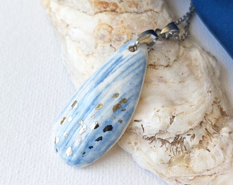 Mussel shell necklace, porcelain pendant, blue, white, silver, organic shape jewelry, 22 carat white gold sparcks.