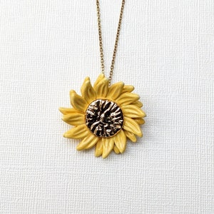 Yellow sunflower necklace, 22 carat painted gold heart, clay sun pendant. image 2