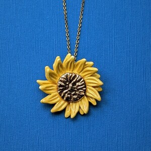 Yellow sunflower necklace, 22 carat painted gold heart, clay sun pendant. image 1