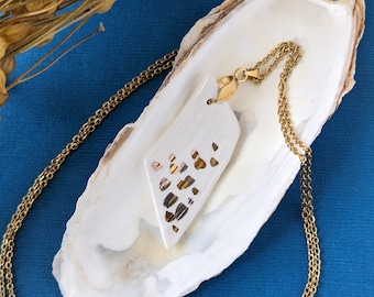 Piece of porcelain pendant, shell necklace, white and gold, organic shape jewelry, 22 carat gold sparks.