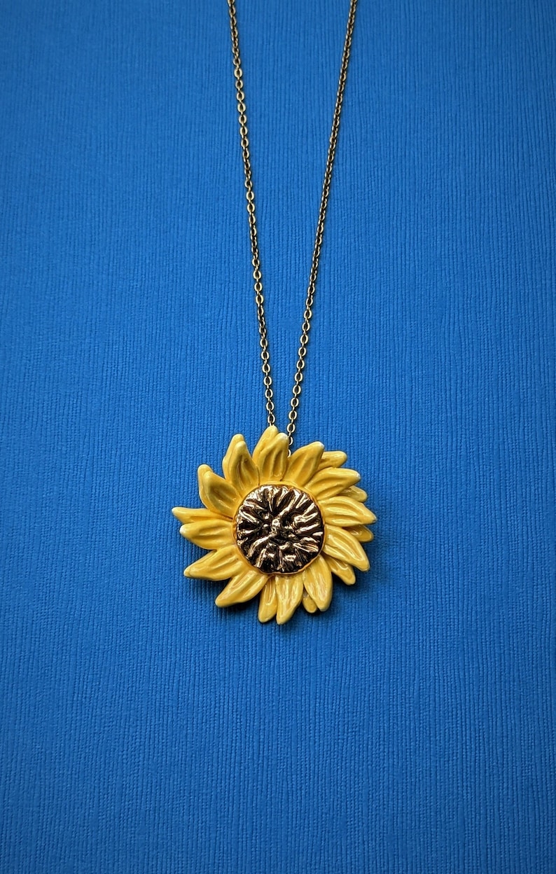 Yellow sunflower necklace, 22 carat painted gold heart, clay sun pendant. image 1