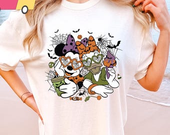 COMFORT COLORS Floral Minnie Daisy Besties Disney Halloween Shirt, Minnie Mouse Daisy Duck Best Friends Girl Trip Shirt, Disneyland Halloween
