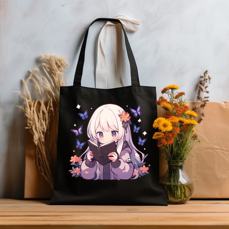 May include: Black tote bag featuring a white and purple anime character reading a book. The character is surrounded by blue butterflies and flowers.