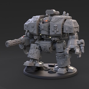 May include: A grey miniature robot figure featuring intricate embossed scrollwork, skull motifs, and chalice emblems. The figure has a multi-barrelled cannon on one arm, a mechanical claw on the other, a missile launcher on top, and glowing red eyes.