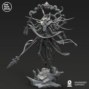 May include: A grey, unpainted resin miniature figure of a multi-armed, skeletal humanoid entity holding a long spear. It features flowing fabric, a circular halo-like structure, and a pyramid top, standing on a rocky base. Text reads ONE PAGE RULES.