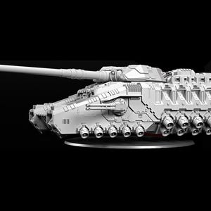 May include: A light gray model of a futuristic tank, featuring a long barrel and multiple exhaust ports. The tank is set against a black background, showcasing its detailed design and mechanical elements. The model is mounted on a circular base.