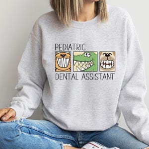 Pediatric Dental Assistant Sweatshirt, Childrens Dentist Assistant Shirt, Funny Pediatric Dentist, Cute Future Dental Assistant Sweater image 1