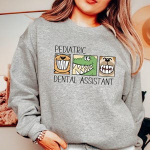 Pediatric Dental Assistant Sweatshirt, Childrens Dentist Assistant Shirt, Funny Pediatric Dentist, Cute Future Dental Assistant Sweater image 3