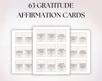 May include: Set of 63 printable gratitude affirmation cards featuring a delicate butterfly design in shades of pink and gray. Each card has a different affirmation printed on it, such as "I am grateful for the love and support of my family."