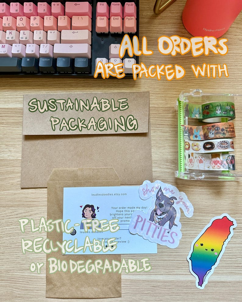 An image of sustainable packaging materials including glassine bags, a paper thank you postcard, and some stickers and washi tape.