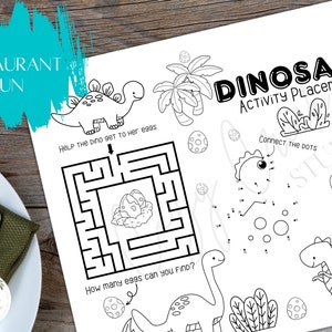 May include: A white dinosaur activity placemat with black line art illustrations. The placemat features a maze, connect-the-dots, and tic-tac-toe, with the text "DINOSAUR ACTIVITY PLACEMAT" and "RESTAURANT FUN".