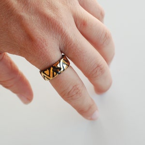 Black Porcelain Ring with Gold Details: Handmade Ceramic Jewelry