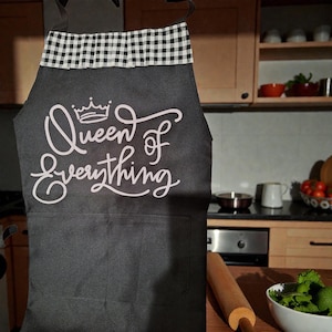 Queen of Everything Apron: Black Apron with Buffalo Check Ruffle